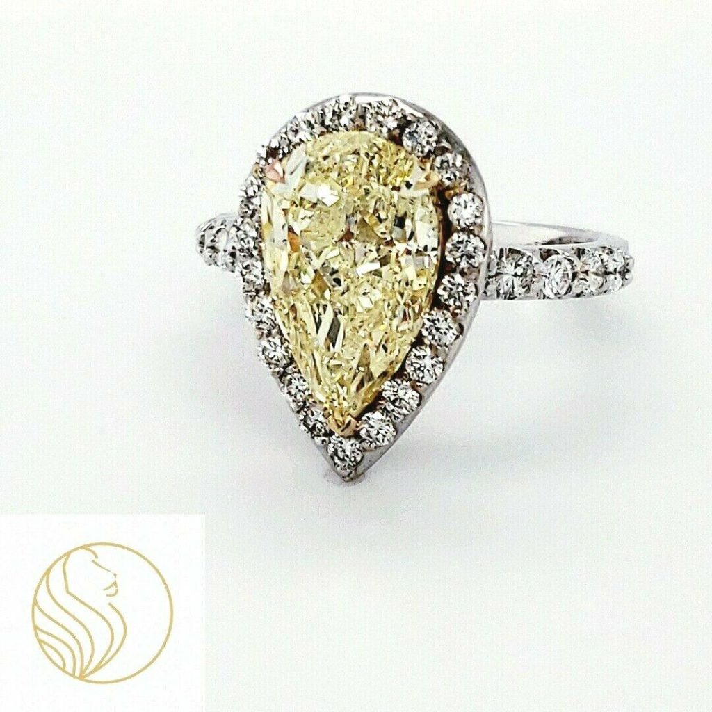 6.15ctw Pear-Shaped Fancy Yellow Halo Diamond Ring + GIA ( Watch Video )
